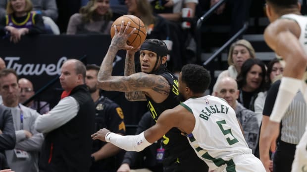 Feb 4, 2024; Salt Lake City, Utah, USA; Utah Jazz guard Jordan Clarkson (00) looks to pass the ball away from Milwaukee Bucks guard Malik Beasley (5) during the second half at Delta Center